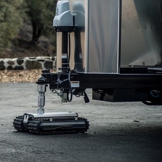 Remote controlled RV and trailer mover with 9,000 lbs. tow capacity
