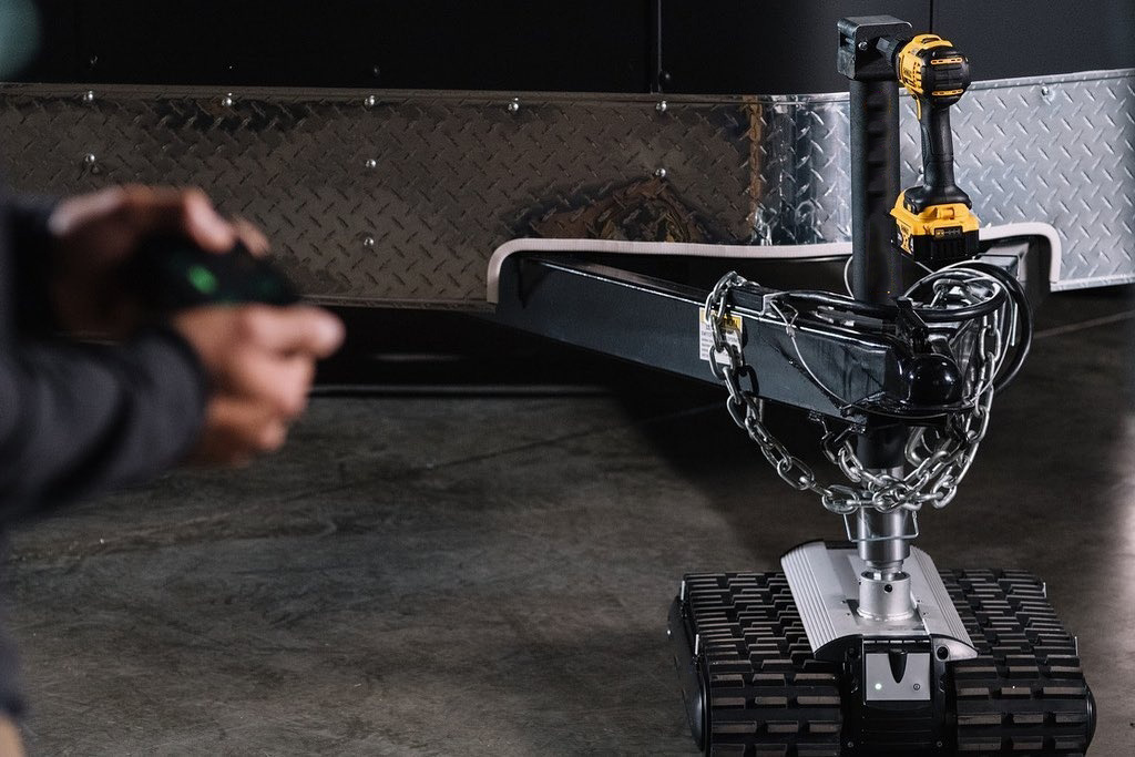 Remote controlled RV and trailer mover with 9,000 lbs. tow capacity