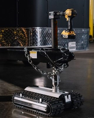 Remote controlled RV and trailer mover with 9,000 lbs. tow capacity