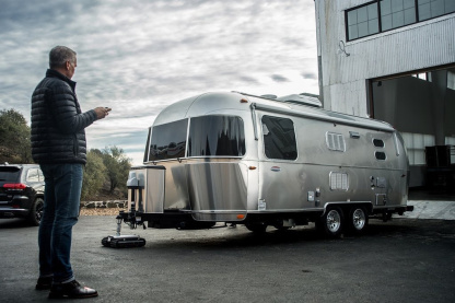 Remote controlled RV and trailer mover with 9,000 lbs. tow capacity