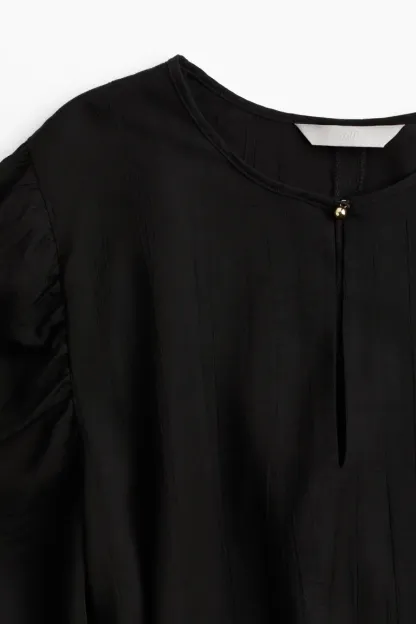Robe à ceinture à nouer