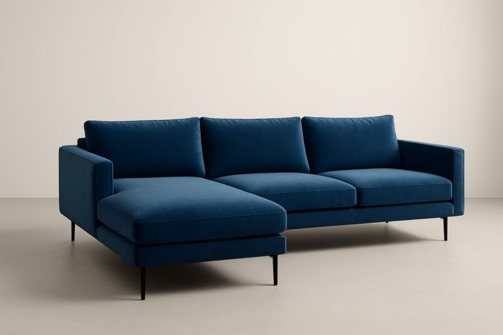 Divano angolare in velluto blu con struttura in legno e gambe in metallo