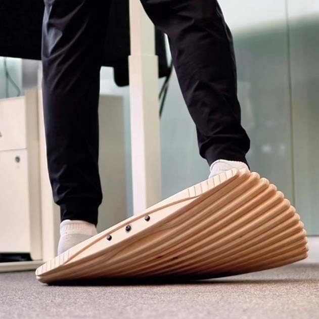 Wooden balance board for standing desks