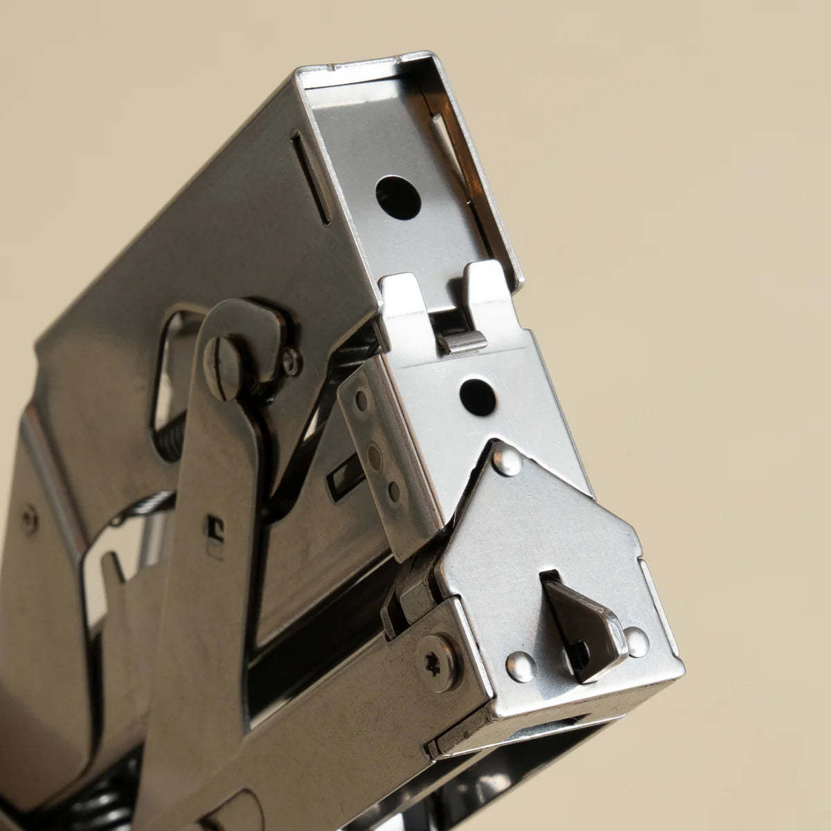 Portable and compact corner nail gun