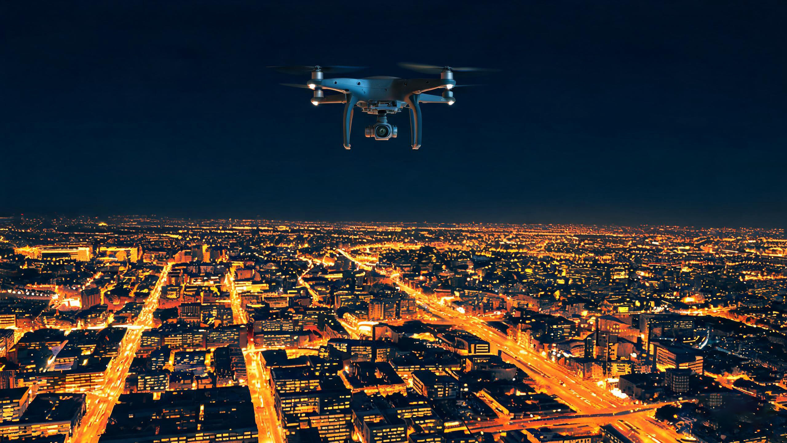 Thermal imaging drone conducting night surveillance over urban area showing heat signatures