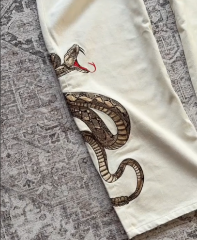 “snake” jeans