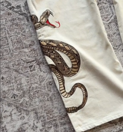“snake” jeans