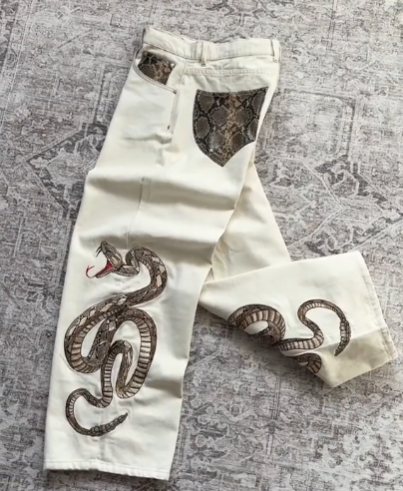 “snake” jeans