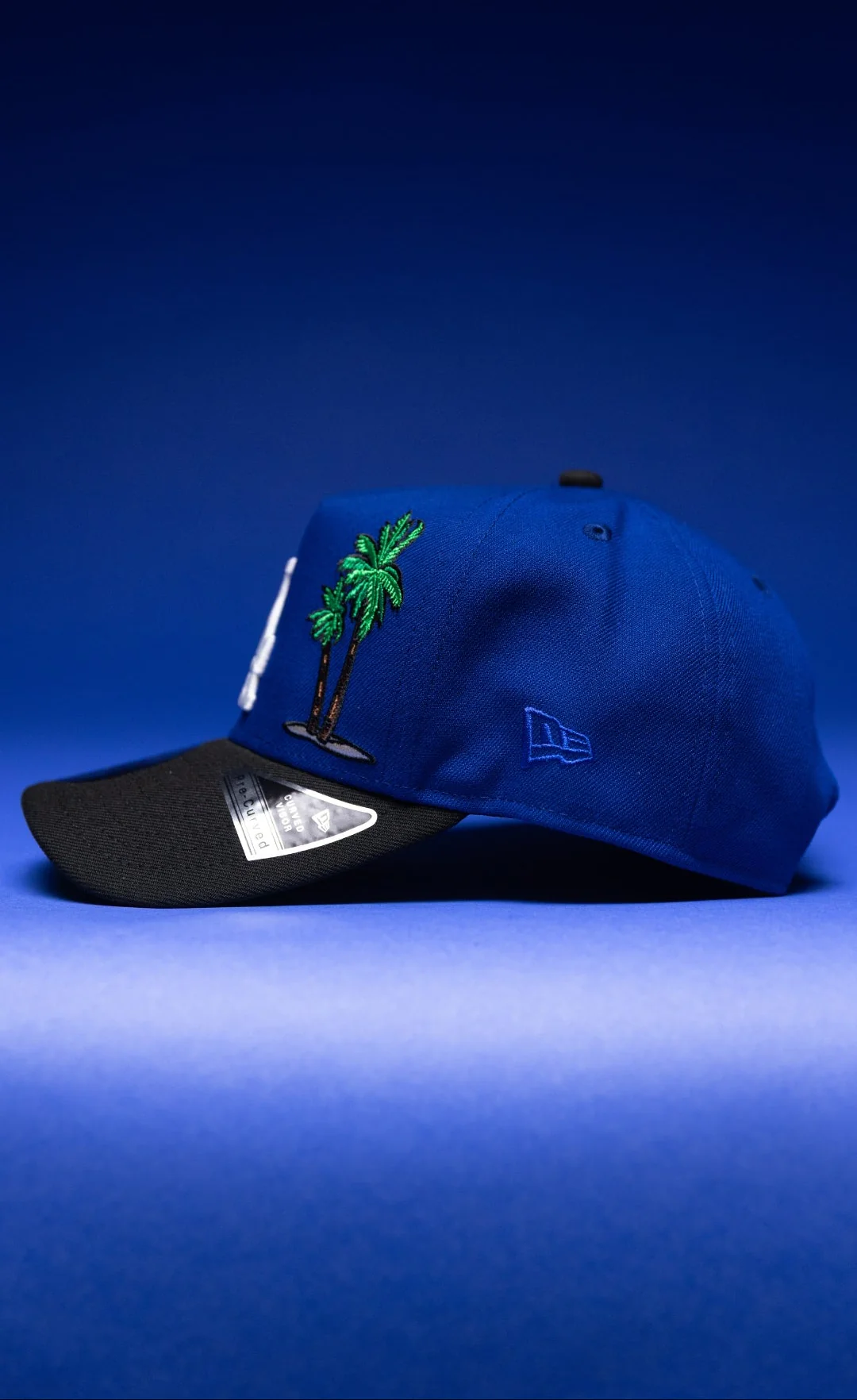 NEW ERA 9FIFTY A-FRAME BLUE/BLACK LOS ANGELES DODGERS SNAPBACK W/PALM TREES + 60TH ANNIVERSARY SIDE THE SOUTH CAP