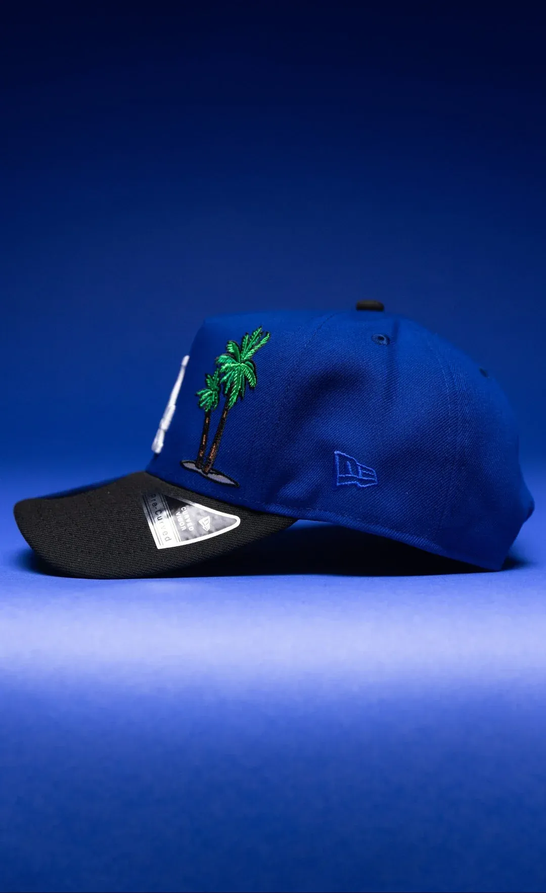 NEW ERA 9FIFTY A-FRAME BLUE/BLACK LOS ANGELES DODGERS SNAPBACK W/PALM TREES + 60TH ANNIVERSARY SIDE THE SOUTH CAP