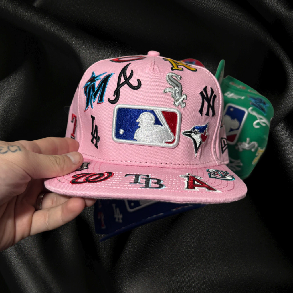 NEW ERA ALL OVER LOGO PINK EMBROIDERED CASUAL BASEBALL CAP-Thesouthcaps