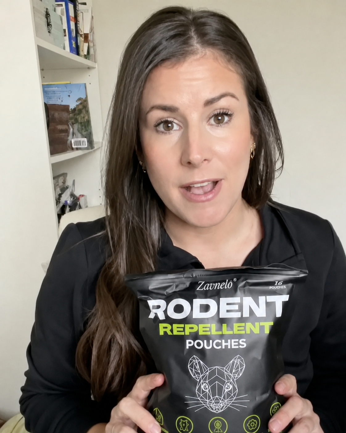 Customer review holding Lovevel Rodent Repellent Pouches