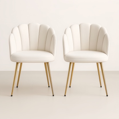 Ensemble de 2 chaises en similicuir blanc avec pieds en métal doré.