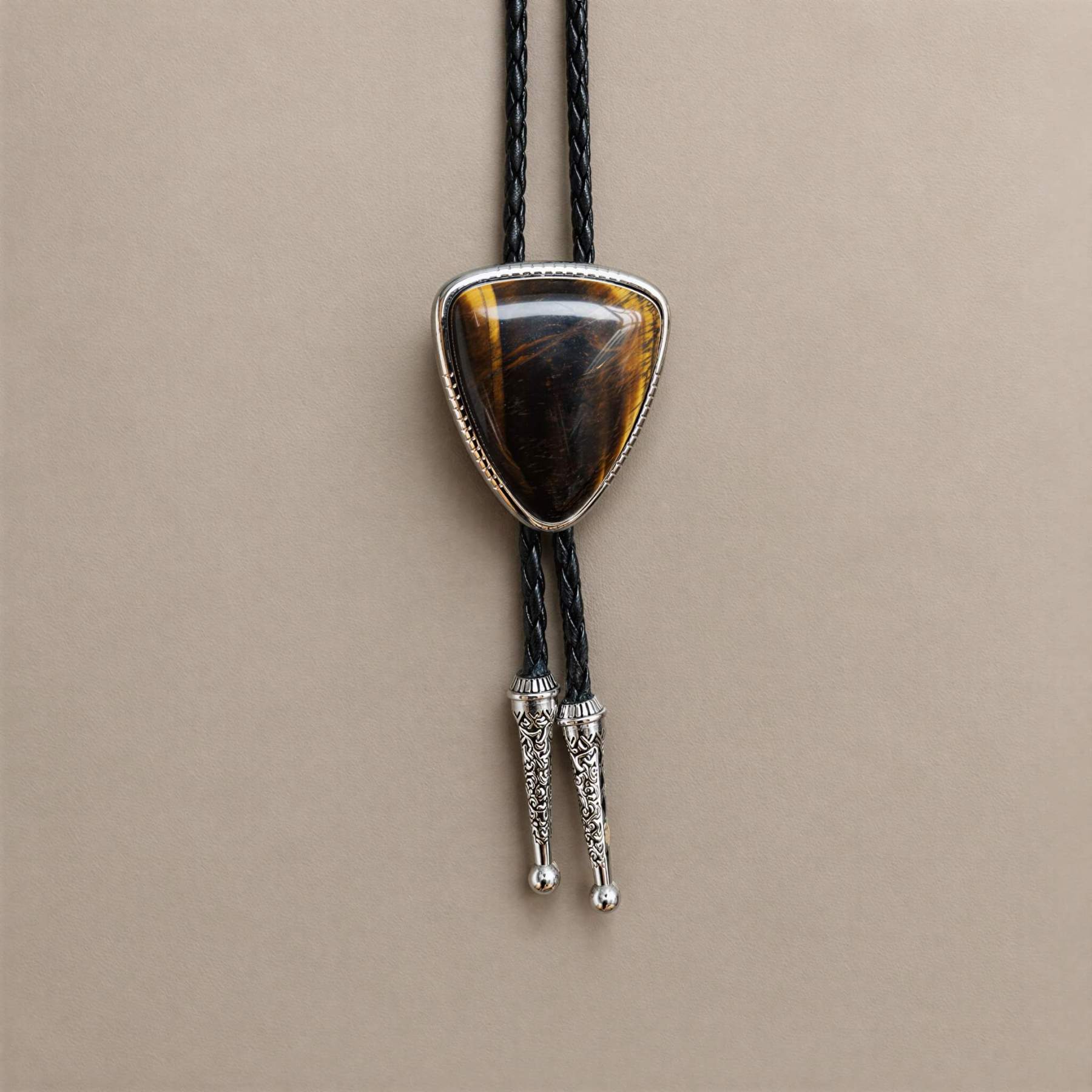 mesathread-triangular-tigers-eye-western-bolo-tie-black-braided-cord-front-view