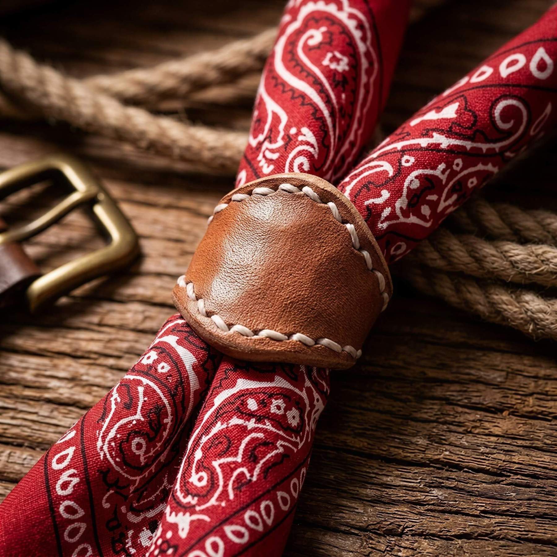 mesathread-frontier-heritage-hand-stitched-leather-wild-rag-slide-saddle-tan-lifestyle