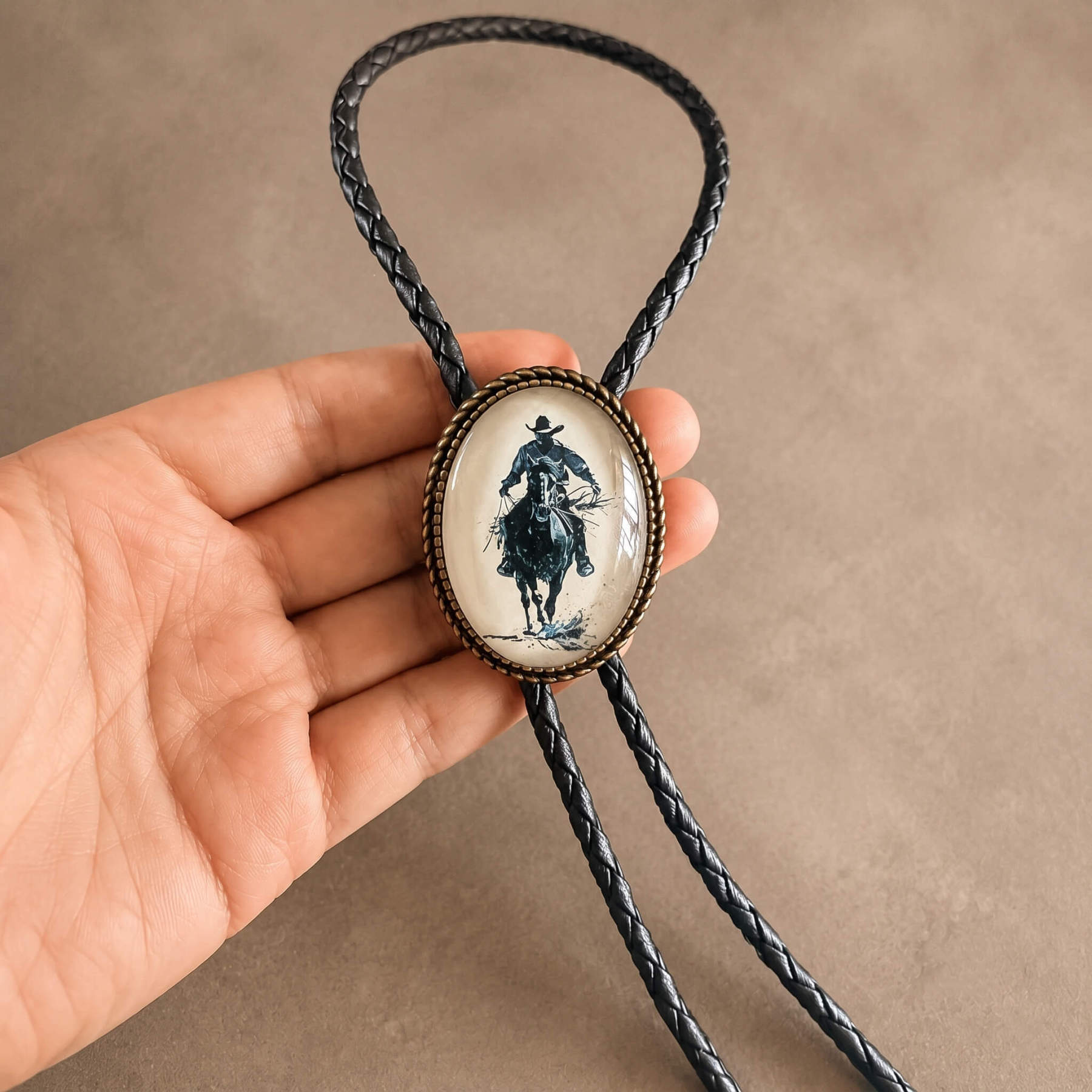 frontiercraft-vintage-riding-cowboy-silhouette-oval-western-bolo-tie-ornament-slide-front-view