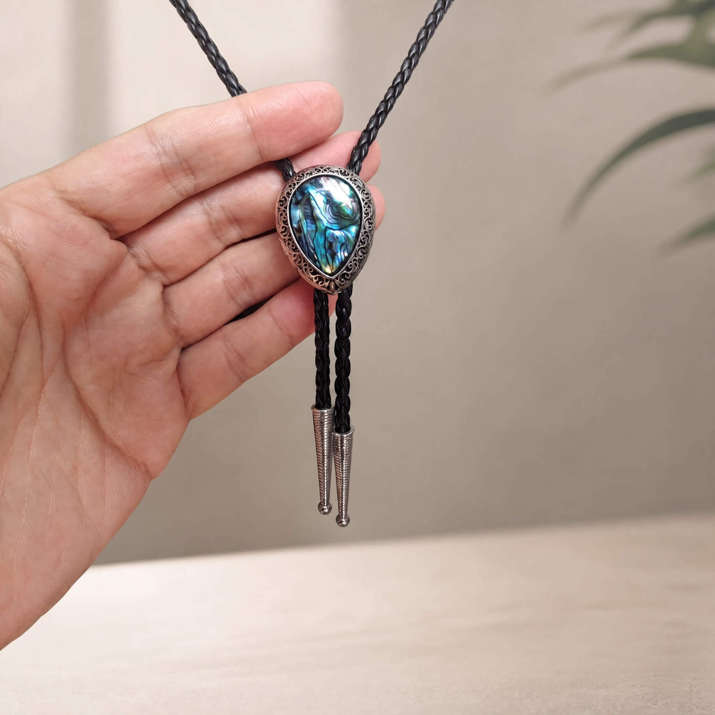 sierracrest-teardrop-iridescent-paua-abalone-shell-western-bolo-tie-ornament-slide-front-view