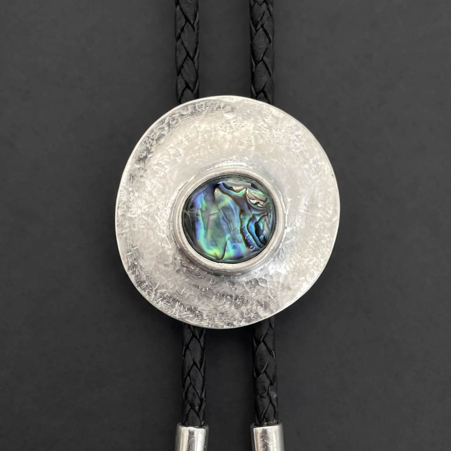 sierracrest-hammered-sterling-concho-iridescent-abalone-western-bolo-tie-ornament-slide-front-view