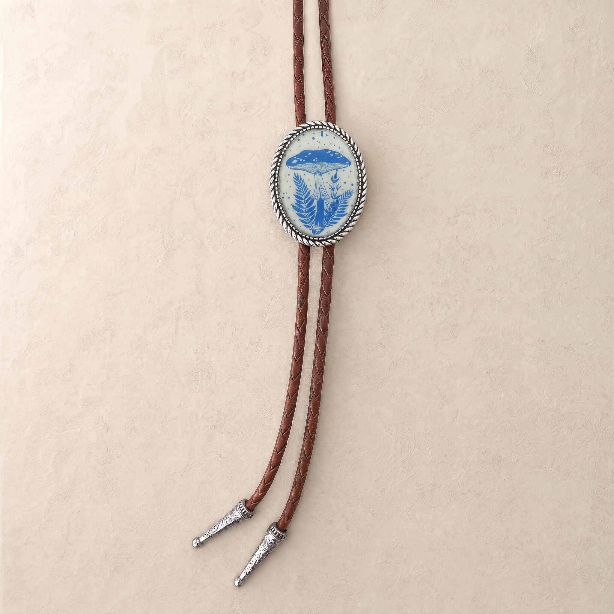 curiocraft-vintage-blue-forest-mushroom-oval-western-bolo-tie-ornament-slide-front-view