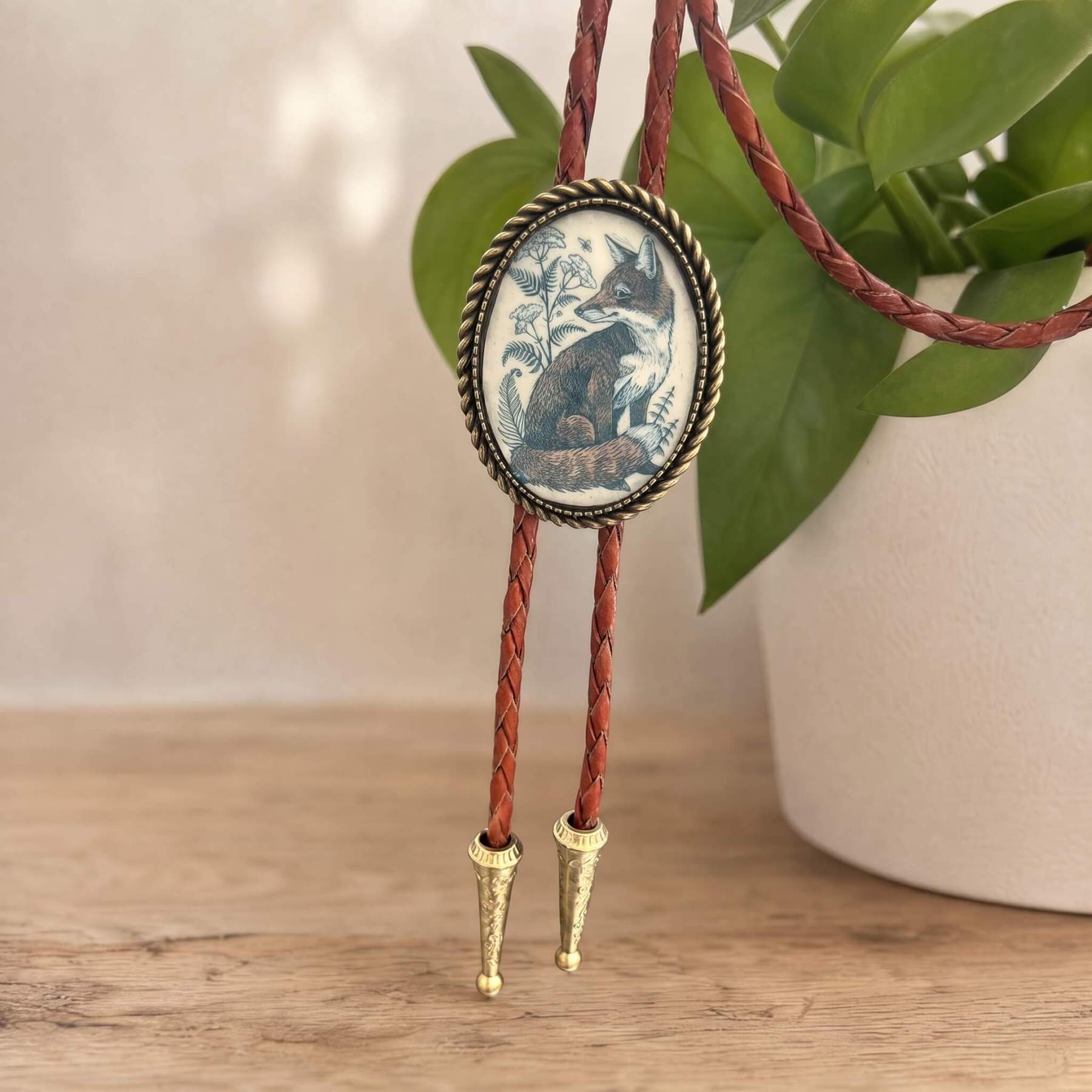 curiocraft-vintage-woodland-fox-botanical-oval-western-bolo-tie-ornament-slide-front-view