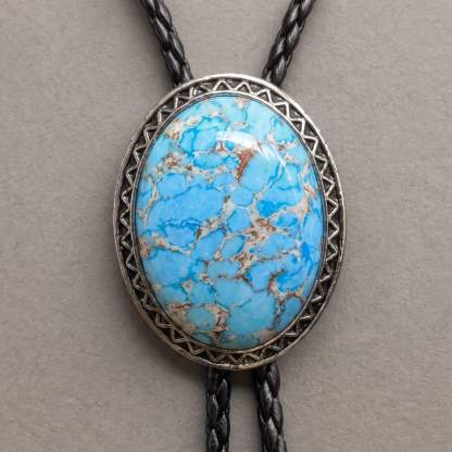 sierracrest-oval-sky-blue-matrix-pattern-chevron-border-western-bolo-tie-ornament-slide-front-view