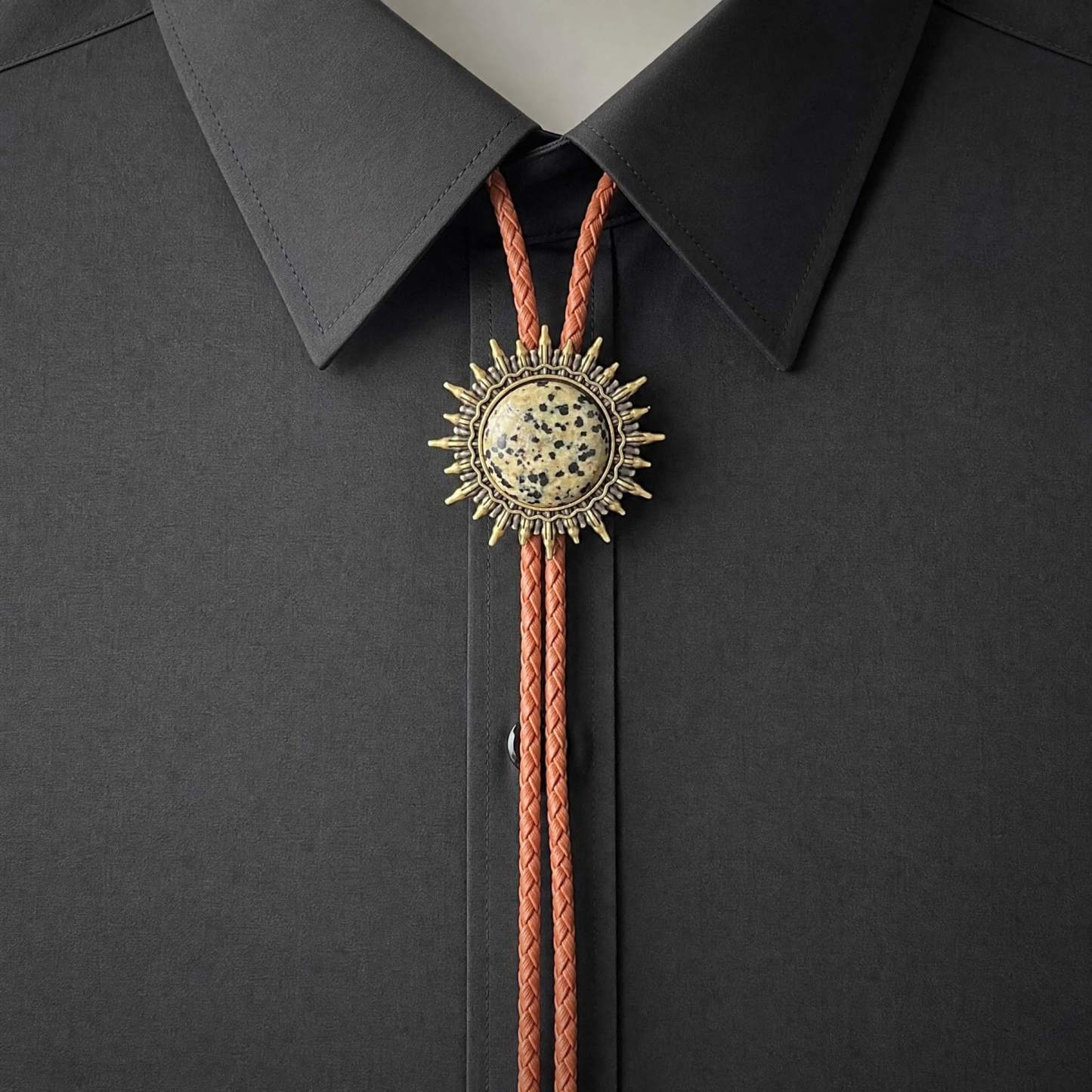 sierracrest-spotted-dalmatian-stone-pattern-sunburst-brass-tone-western-bolo-tie-ornament-slide-front-view