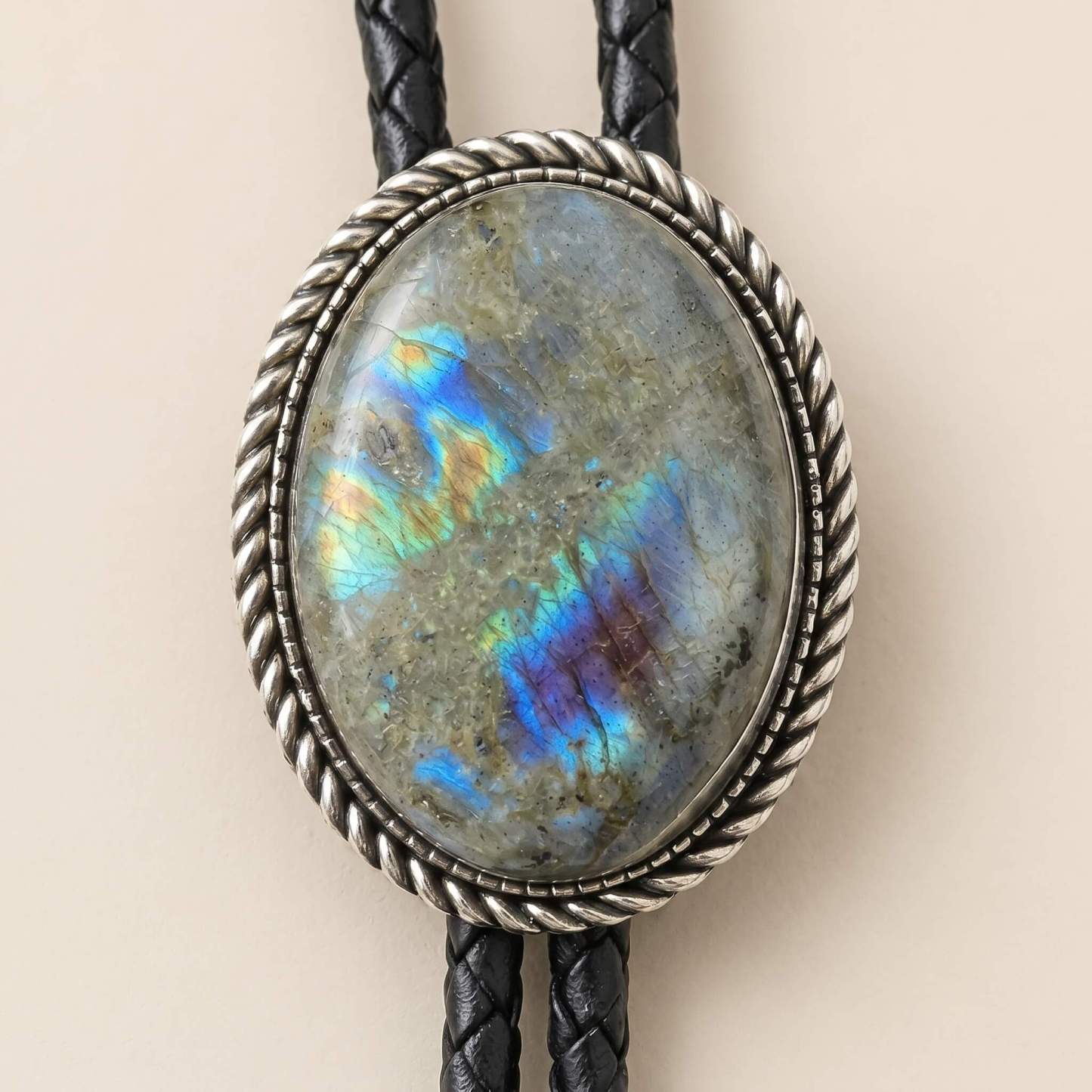 sierracrest-iridescent-spectralite-labradorite-pattern-oval-silver-tone-twisted-rope-western-bolo-tie-ornament-slide-front-view