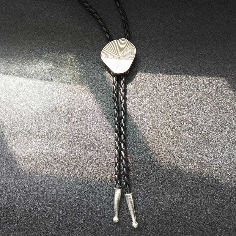 Metal Annual Bolo Tie-MesaThread
