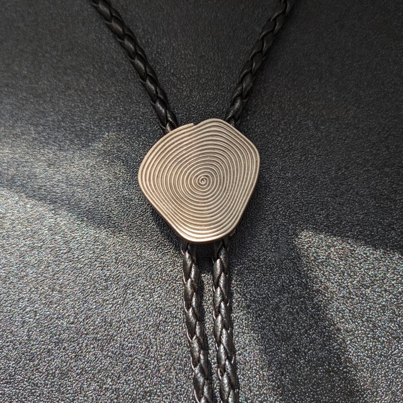 Metal Annual Bolo Tie-MesaThread