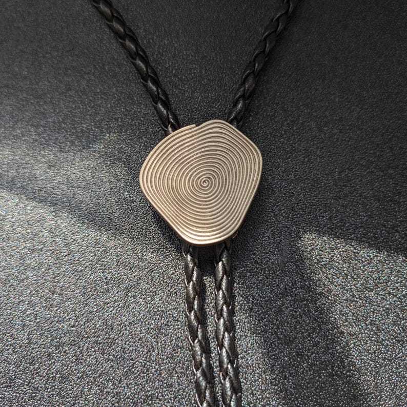 Metal Annual Bolo Tie-MesaThread