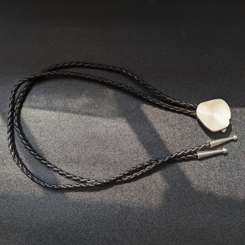 Metal Annual Bolo Tie-MesaThread