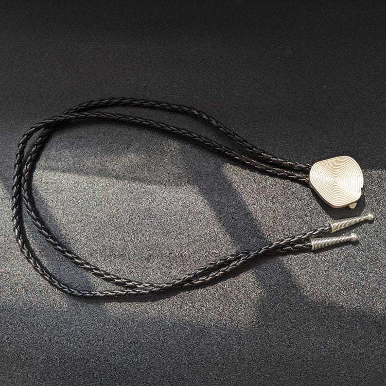 Metal Annual Bolo Tie-MesaThread