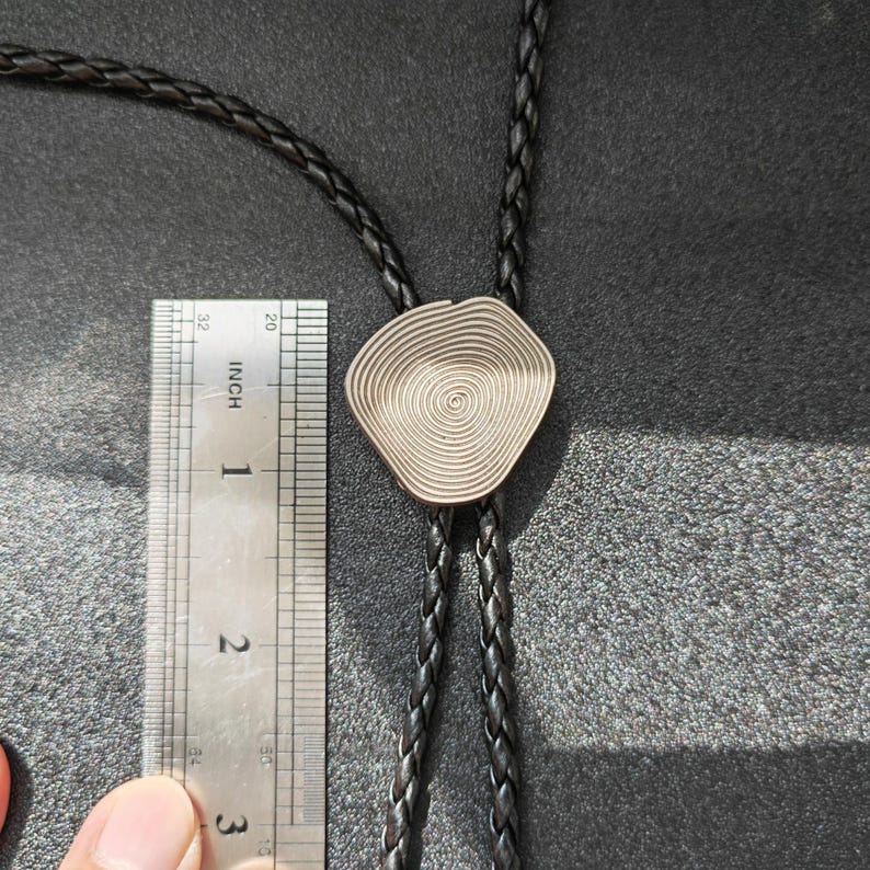 Metal Annual Bolo Tie-MesaThread