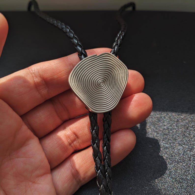 Metal Annual Bolo Tie-MesaThread