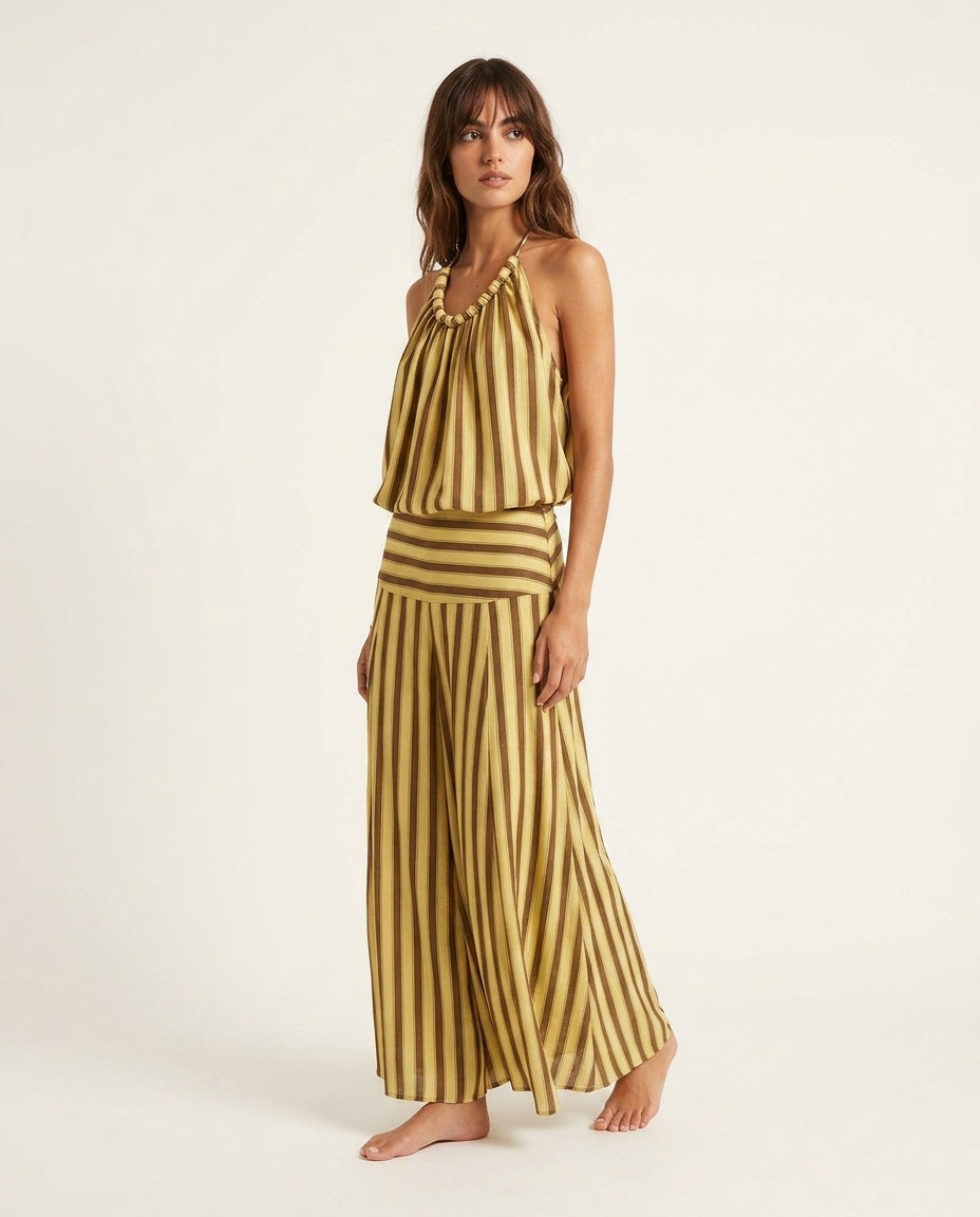Butter Yellow Charm Resort Striped Romper Butter Yellow Romper with Relaxed Fit silhouette and Textured texture, clean studio product view for Resort Wear, an estate dinner at golden hour, US East / Hamptons Elite by Massicos