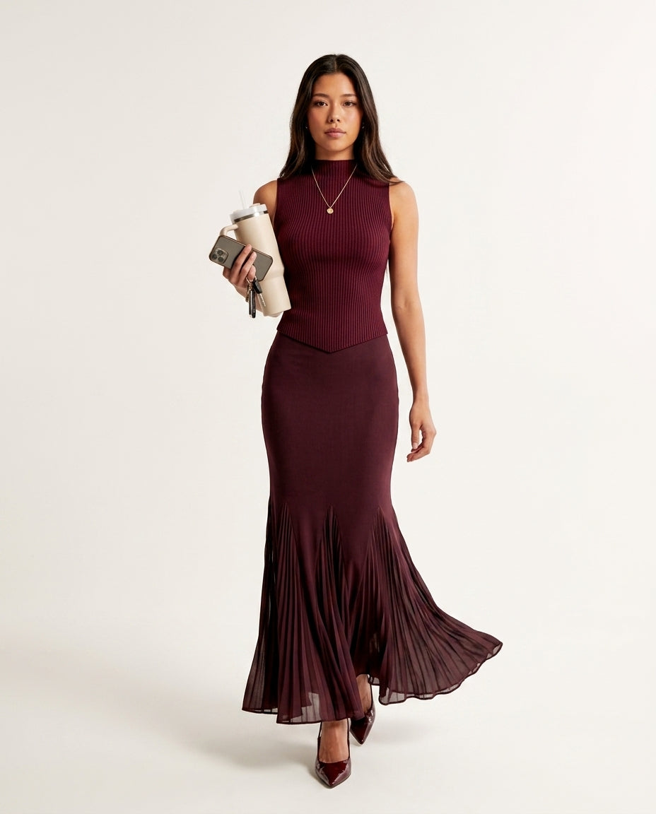 Burgundy Poise Summer Pleated Maxi Dress Burgundy Maxi Dress with Asymmetric silhouette and Ribbed Knit texture, clean studio product view for Resort Dinner, a private garden lunch, US East / Hamptons Elite by Massicos