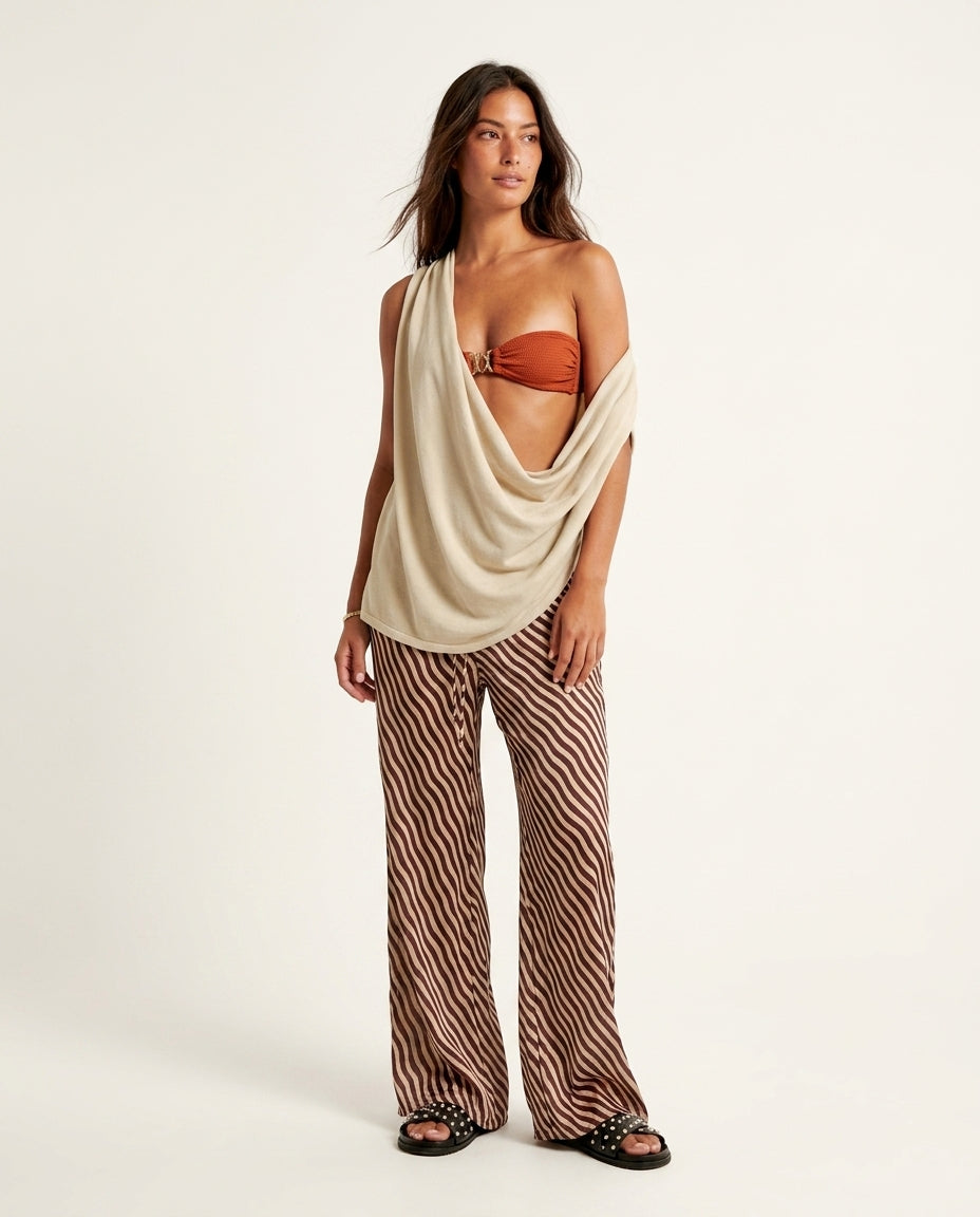 Ivory Lustre Resort Top Ivory Top with Asymmetric silhouette and Ribbed Knit texture, clean studio product view for Resort Wear, a London dinner reservation, Euro Chic Premium by Massicos