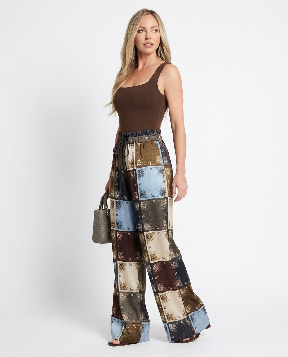 Brown Aura Resort Printed Pants Brown Pants with Wide-Leg silhouette and Satin texture, side or back garment view for Resort Wear, a rooftop dinner in LA, US Coastal Glam by Massicos