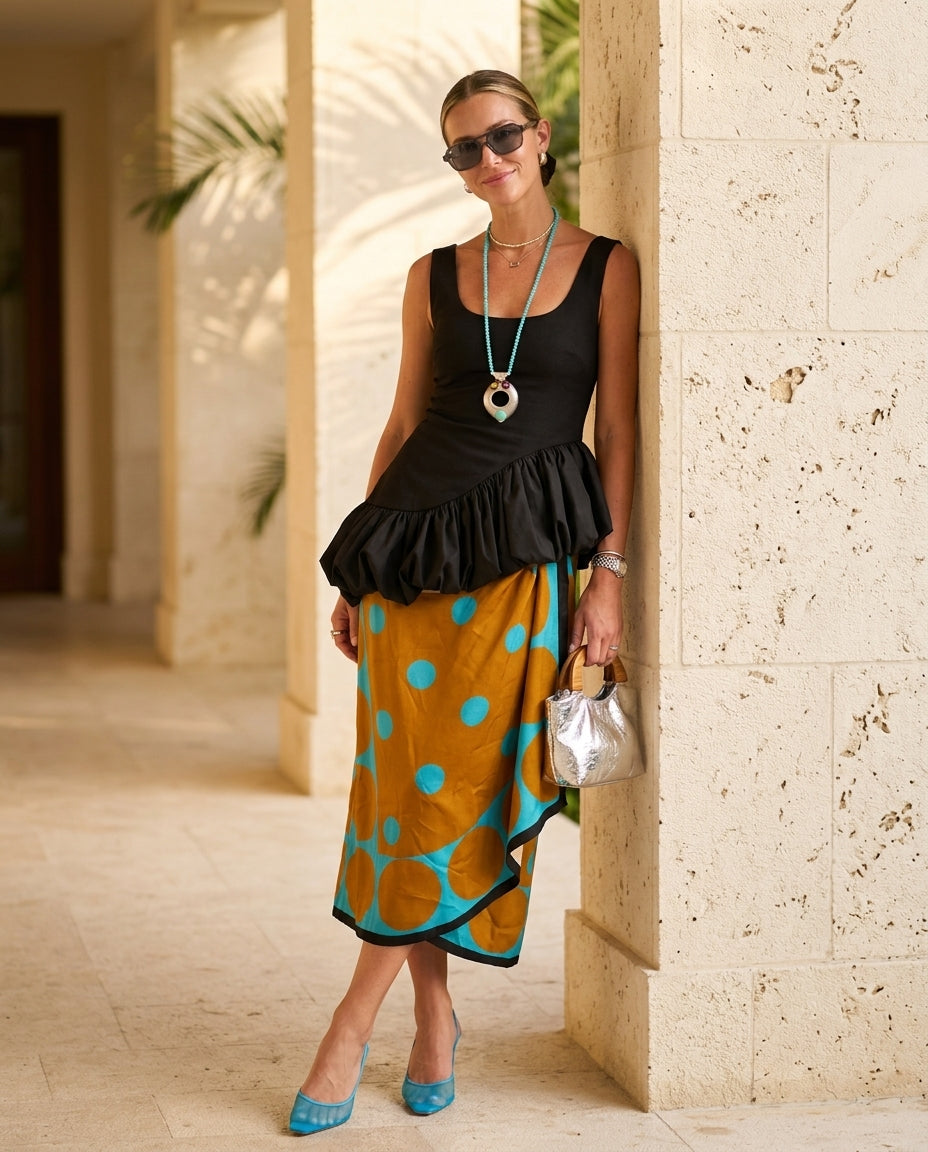Black Allure Summer Polka Dot Skirt Set Black Skirt Set with Relaxed Fit silhouette and Textured texture, lifestyle scene image for Vacation Set, a gallery opening in Paris, Euro Chic Premium by Massicos