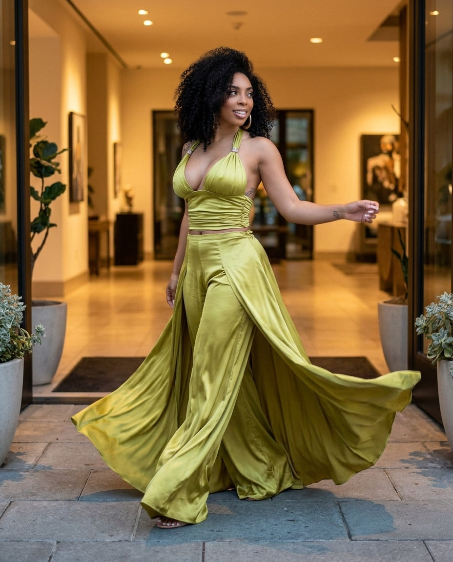 Olive Green Whisper Wedding Guest Satin Jumpsuit Olive Green Jumpsuit with Wide-Leg silhouette and Satin texture, outdoor styling image for Wedding Guest, a gallery evening, Fall current summer selling first with a light late-summer/pre-fall accent: make by Massicos