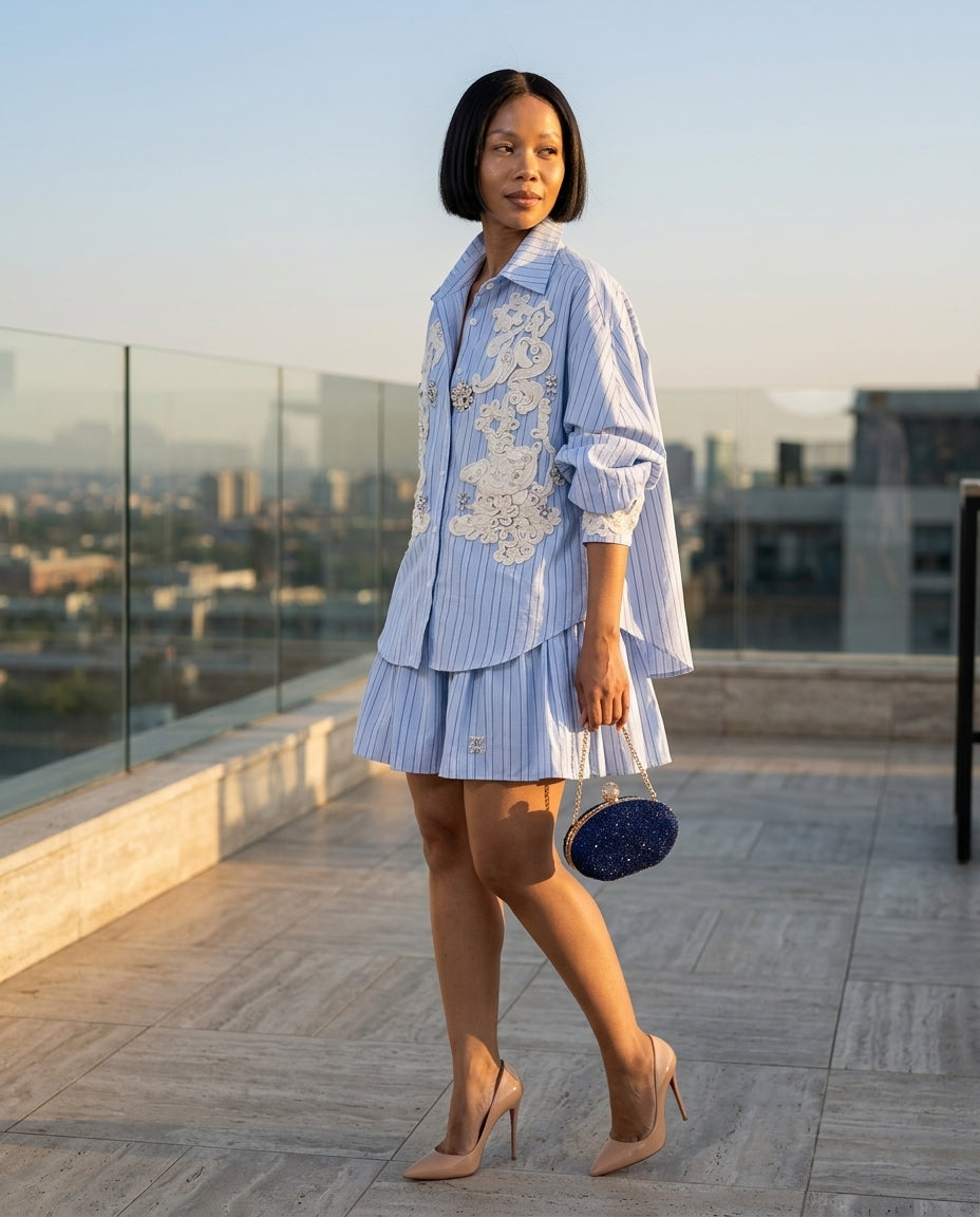 Light Blue Whisper Resort Embroidered Skirt Set Light Blue Skirt Set with Asymmetric silhouette and Textured texture, outdoor styling image for Resort Wear, a gallery opening in Paris, Euro Chic Premium by Massicos
