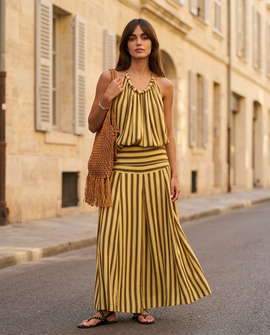 Butter Yellow Charm Resort Striped Romper Butter Yellow Romper with Relaxed Fit silhouette and Textured texture, fabric and construction detail for Resort Wear, an estate dinner at golden hour, US East / Hamptons Elite by Massicos
