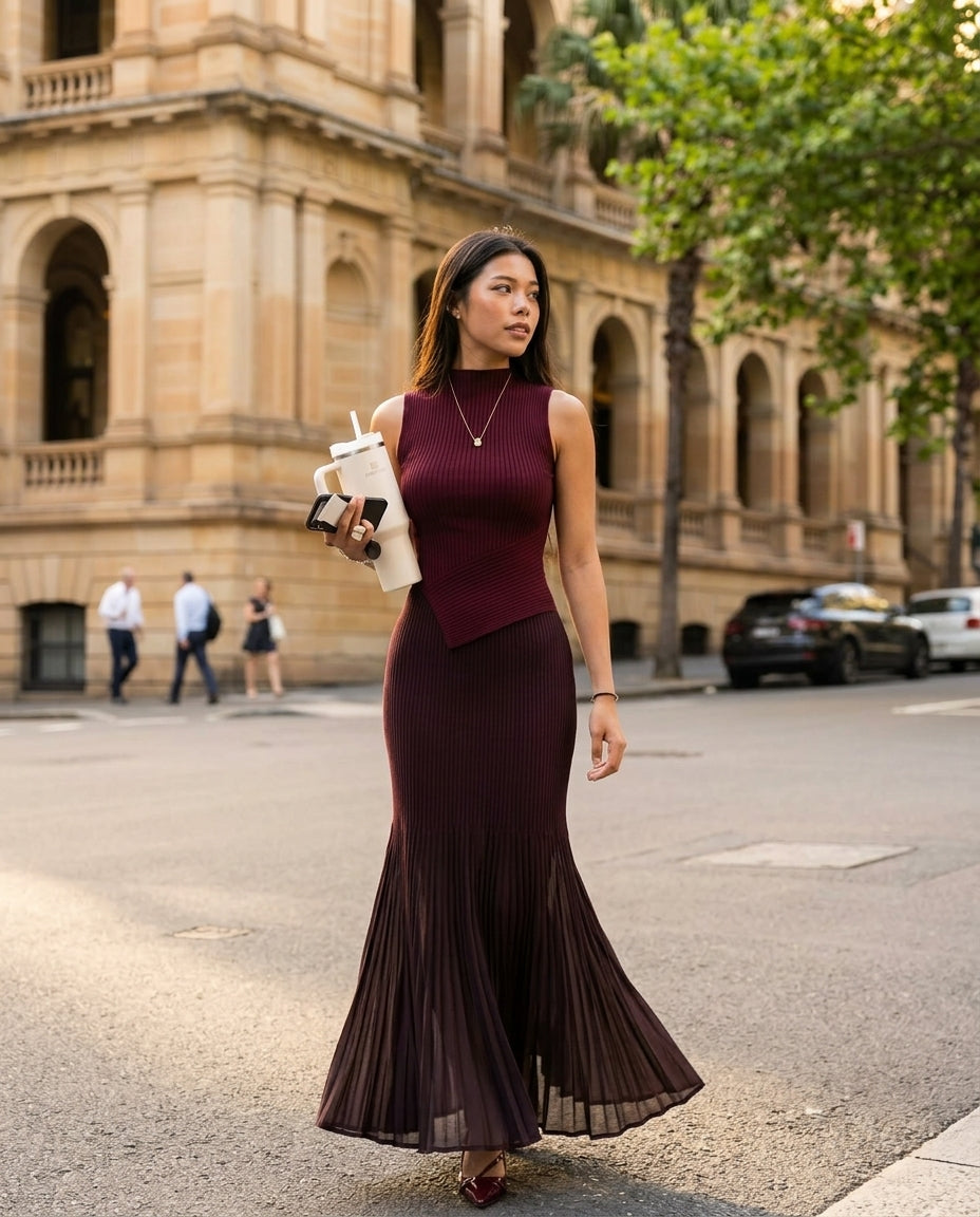 Burgundy Poise Summer Pleated Maxi Dress Burgundy Maxi Dress with Asymmetric silhouette and Ribbed Knit texture, fabric and construction detail for Resort Dinner, a private garden lunch, US East / Hamptons Elite by Massicos