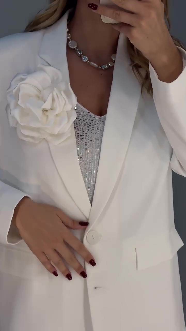 Designer chic suit + chic sequined dress