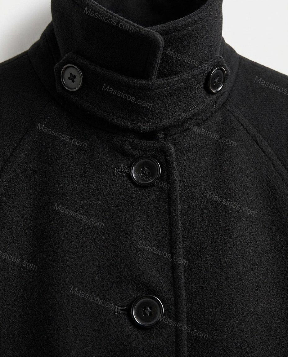 Black Coat, close-up of button closure, side pockets and cuff tabs, by Massicos