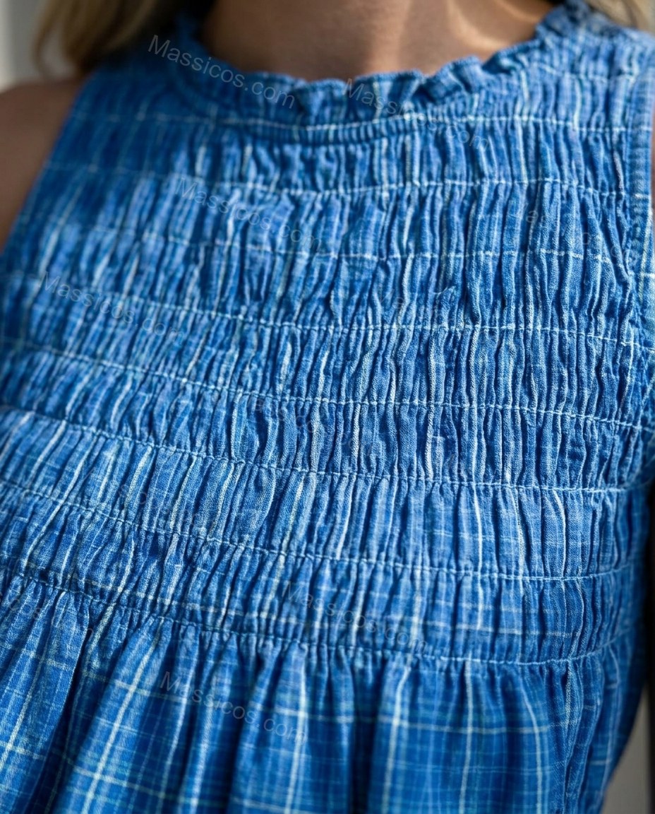 Blue Allure City Layer Smocked Romper Blue Romper with Relaxed Fit silhouette and Textured texture, additional styling view for Pre-Fall, a cafe plan, Fall current summer selling first with a light late-summer/pre-fall accent: make it wearable now for sum by Massicos