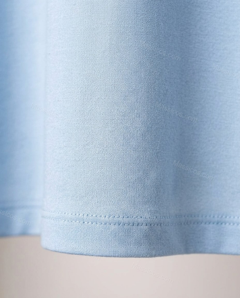 Light Blue Maxi Dress, close-up of gathered bodice, cut-out detail at center front and deep plunging neckline, by Massicos