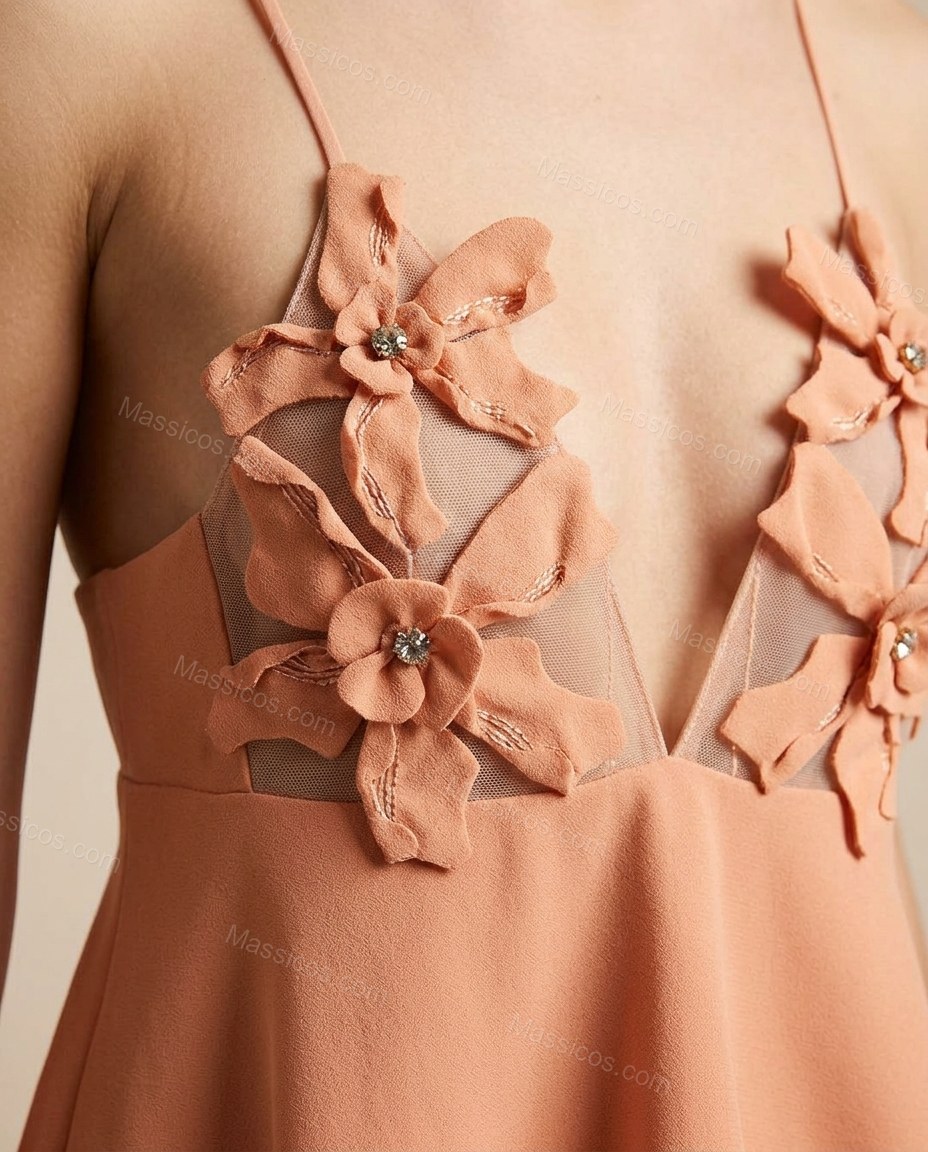 Peach Maxi Peplum Dress, close-up of floral appliqués, sheer panel at bust and draped bodice overlay, by Massicos