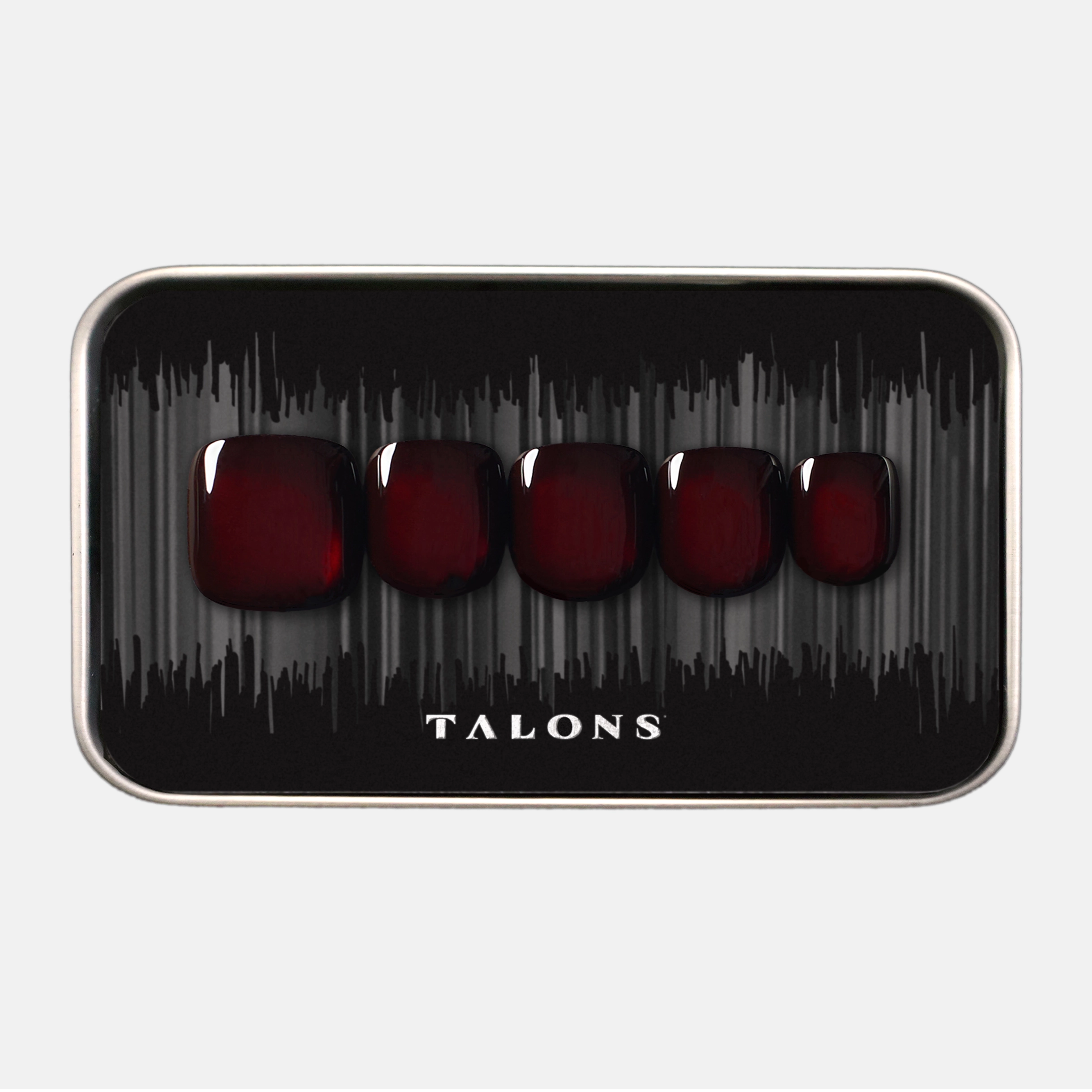 product packaging shot showcasing men's press on nails with a gleaming red design