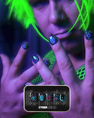 image of a man wearing a press on nail set featuring a glowing circuitry crawling across a matte black base like code breaking through the system. Electric purple and cyan pathways power skull, heart, and eye icons